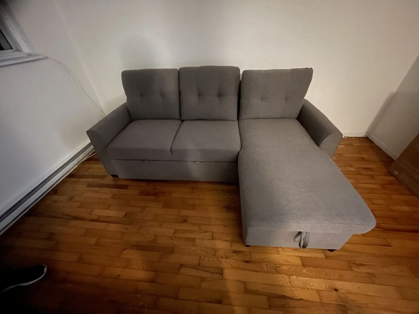 Sofa gris avec chaise longue